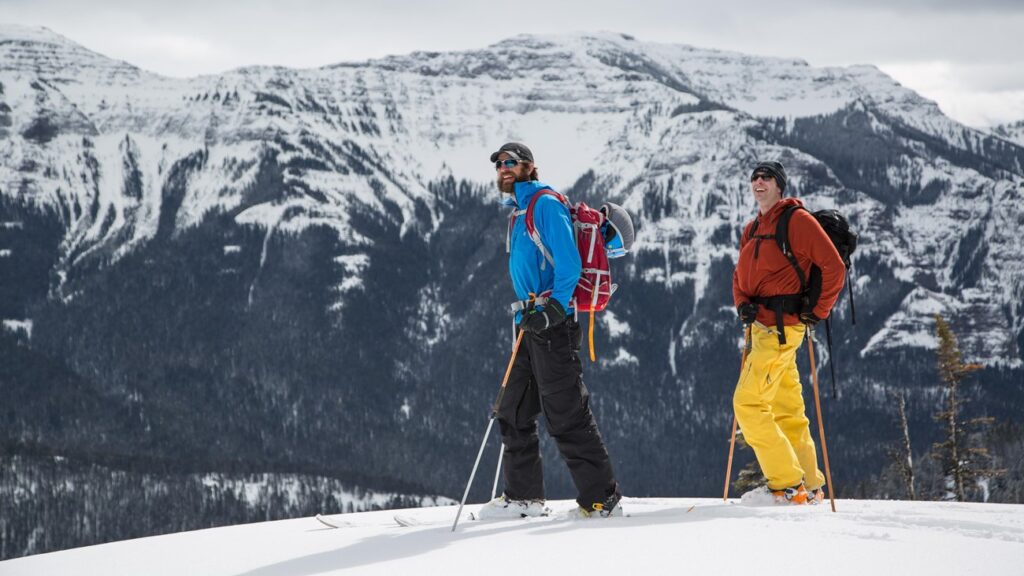 Image of two people on a snowy hike